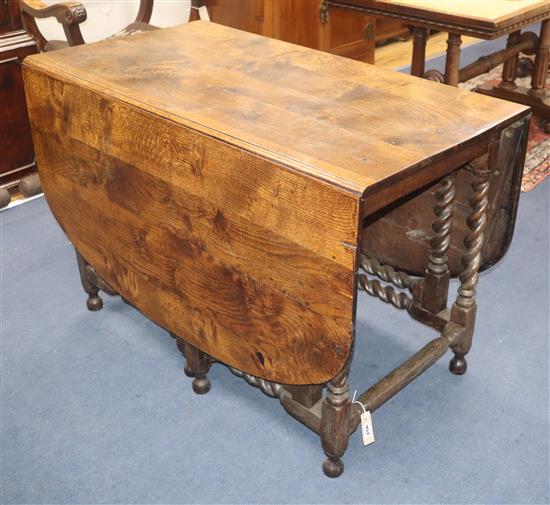 An 18th century oak gateleg dining table